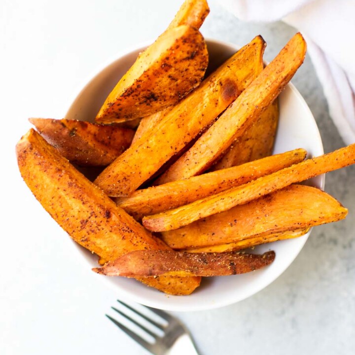 baked sweet potatoes in a bowl overhead
