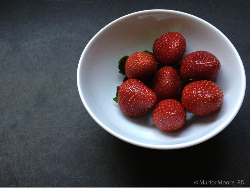 Strawberries on black board  