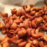 Maple Chili Roasted Cashews on parchment