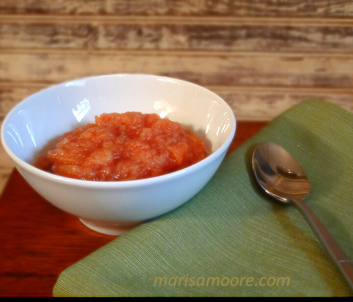 applesauce in a bowl with a spoon