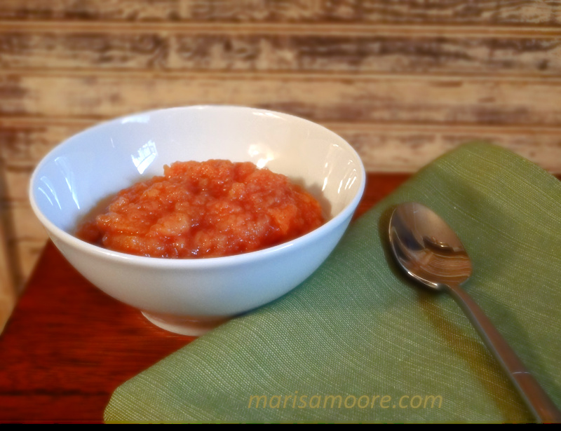 applesauce in a bowl with a spoon