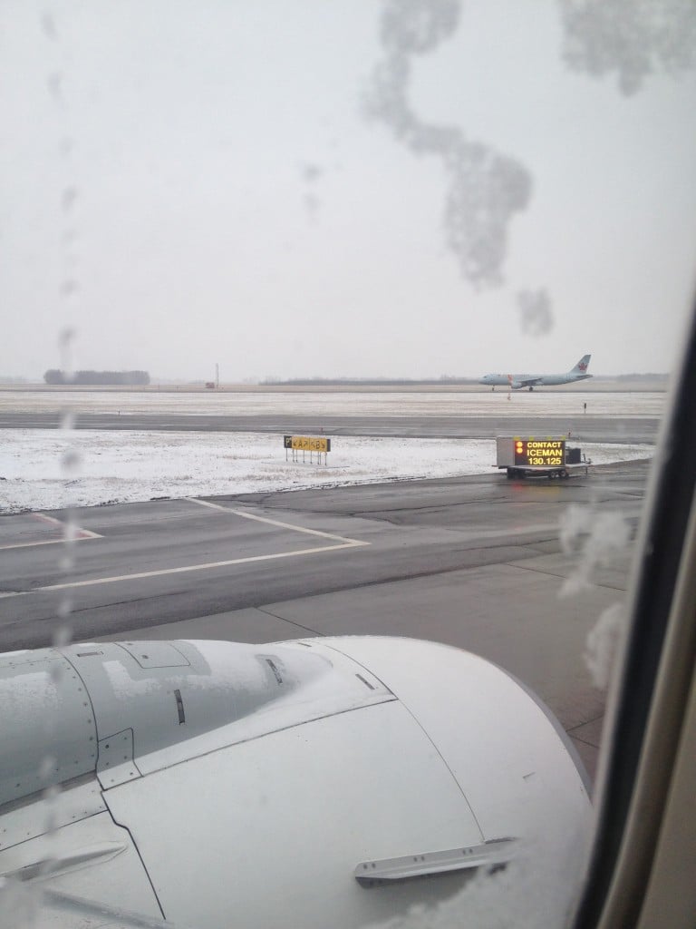 Snow in Edmonton - Plane Being De-iced