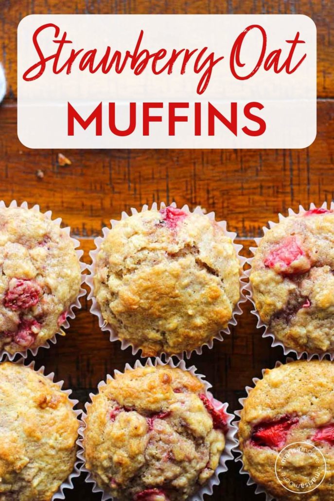 Strawberry muffins on a brown table