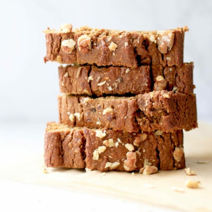 Pumpkin Banana Nut Bread slices stacked