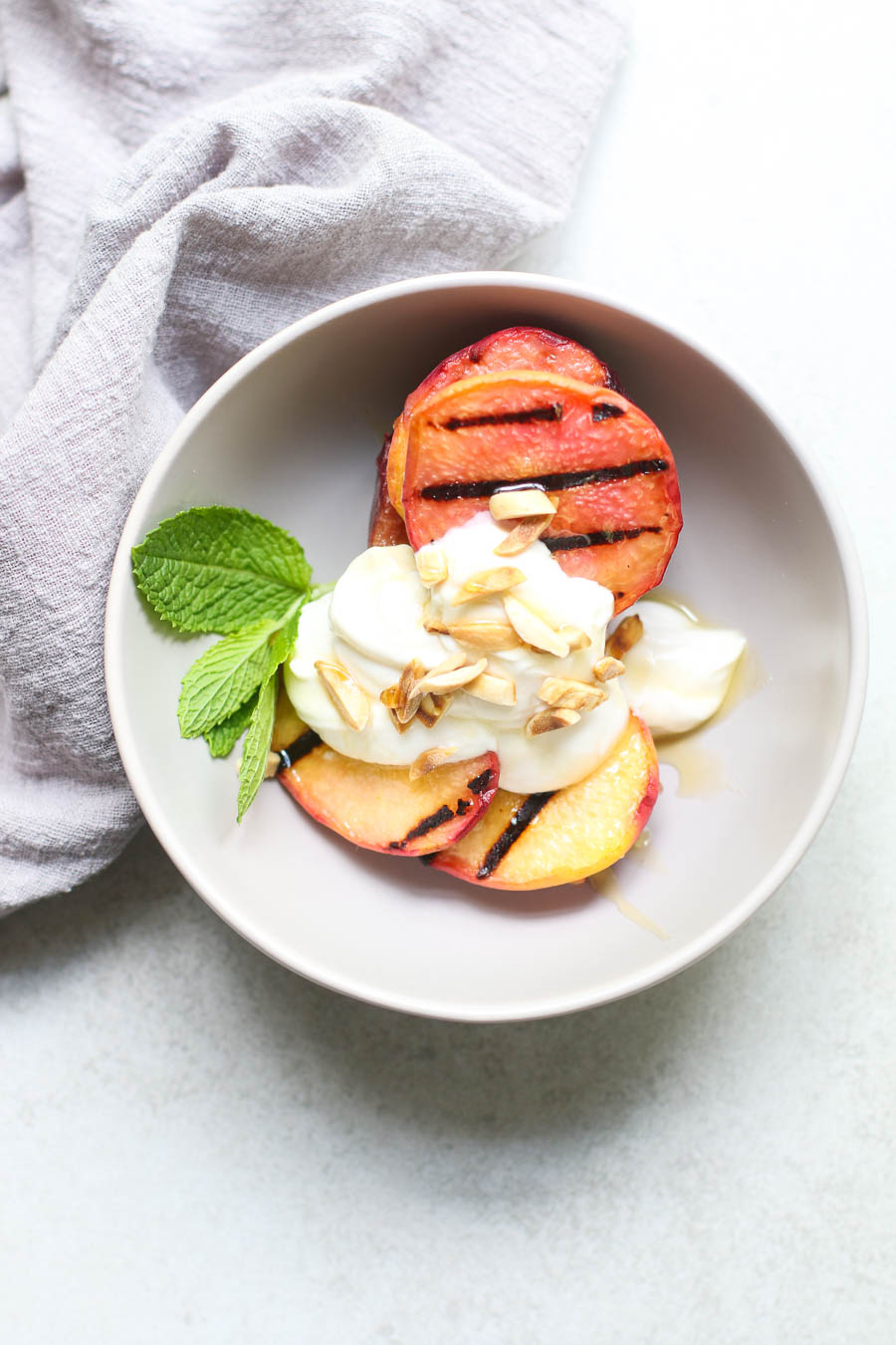 Grilled Peaches and Cream Overhead with Grey Napkin
