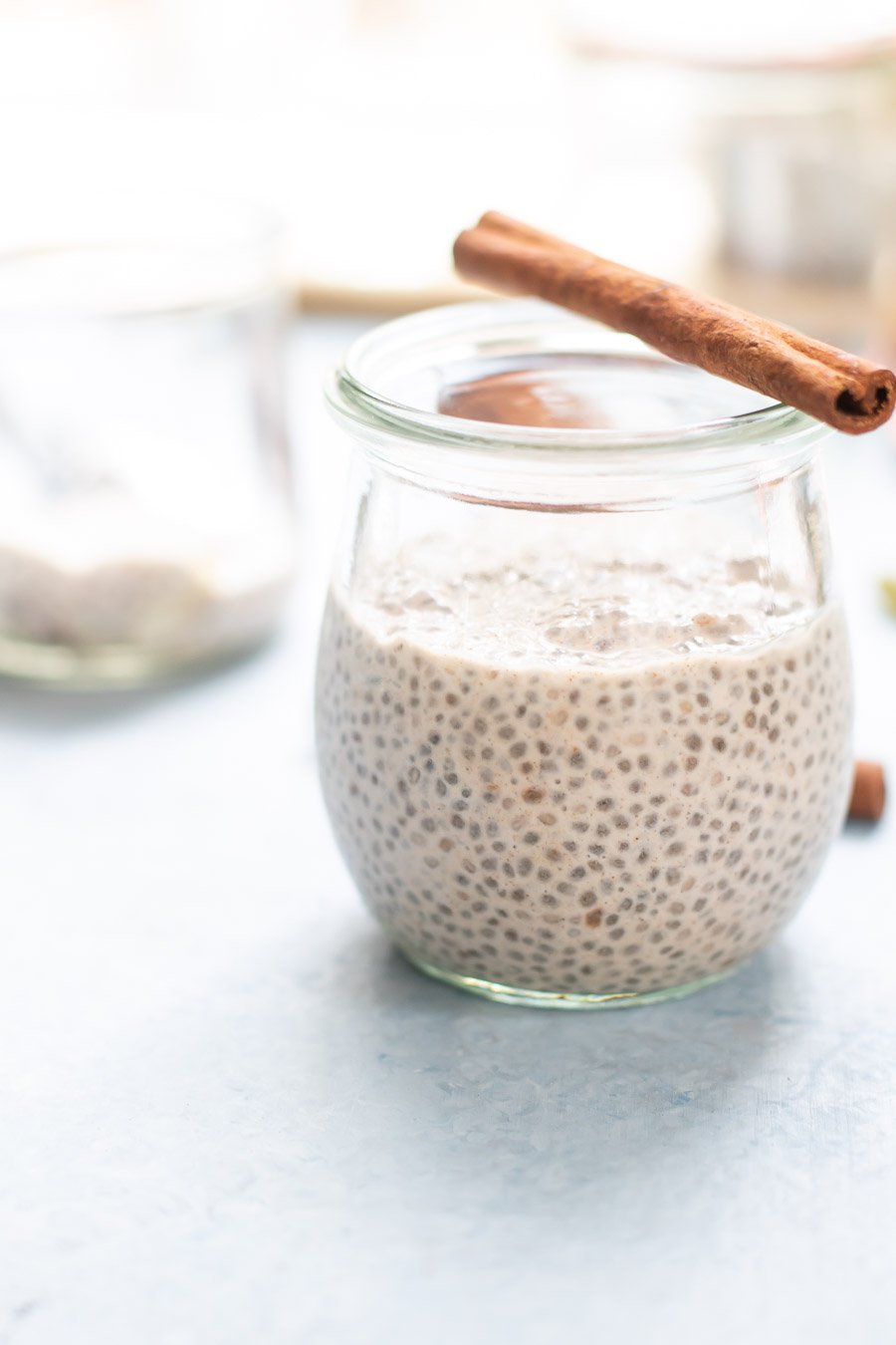 Collagen Chia Pudding in jars with cinnamon stick