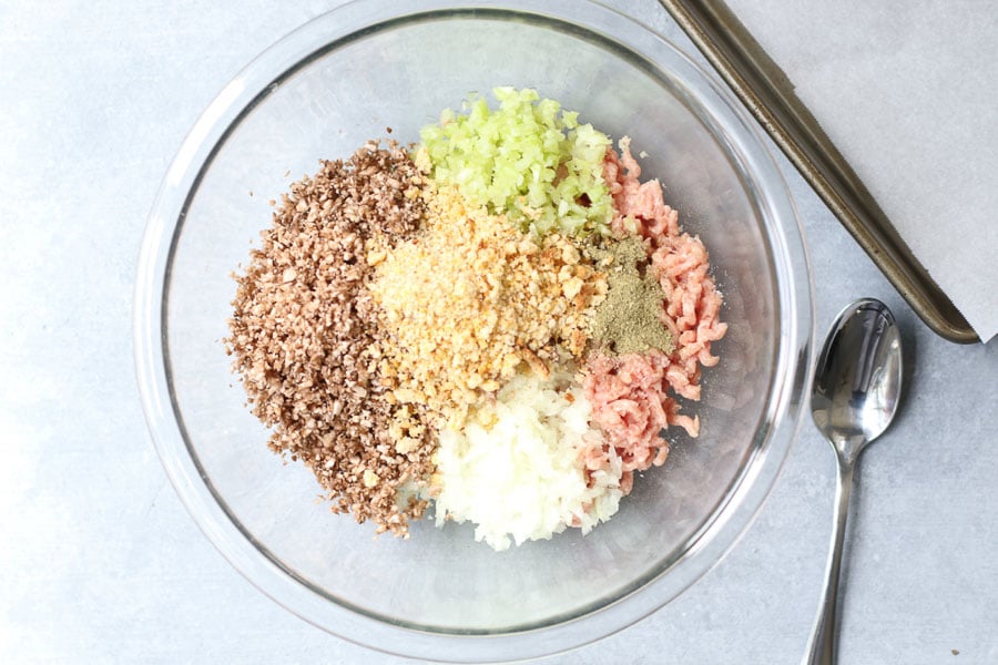 Turkey and Mushroom Meatball ingredients in a bowl with a spoon