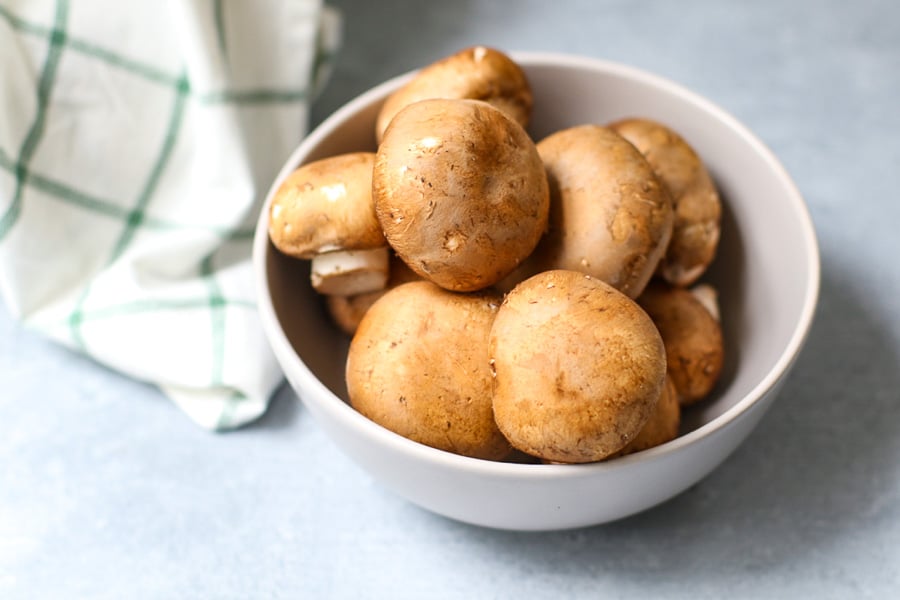 Mushrooms in a bowl with a napkin