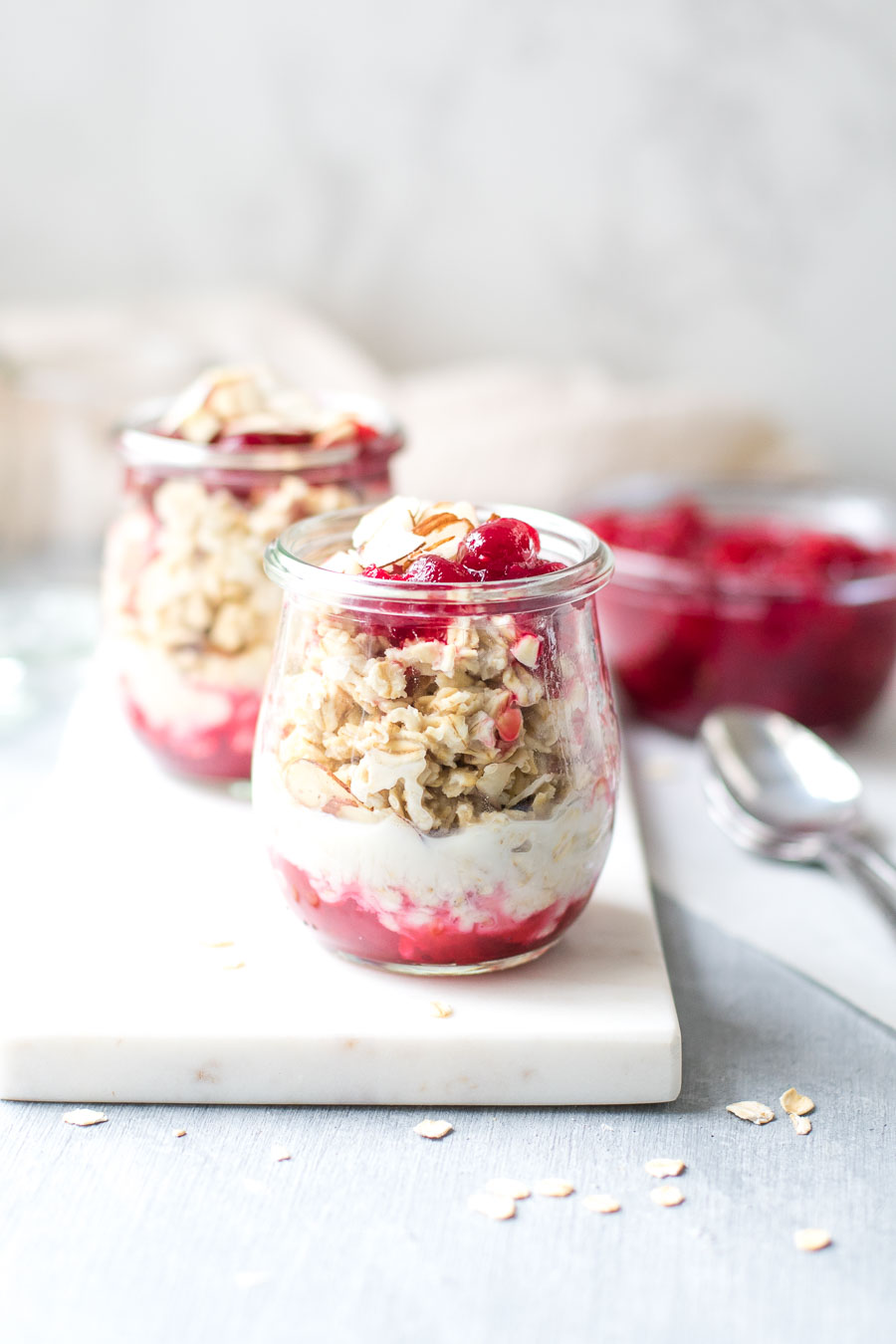 Cranberry Sauce Overnight Oats with Almonds in jars