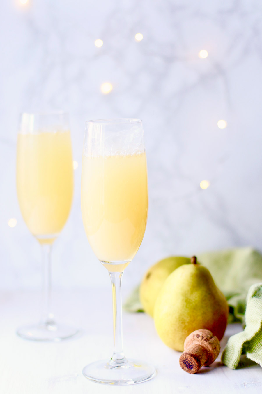 Pear Prosecco Punch in flutes