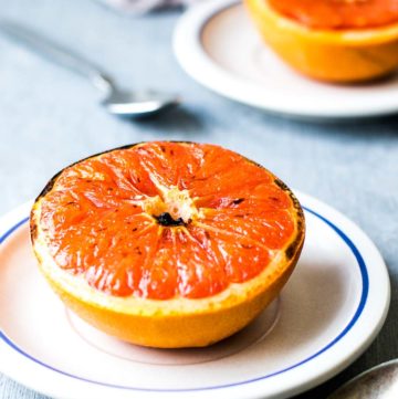 Broiled Grapefruit on two plates