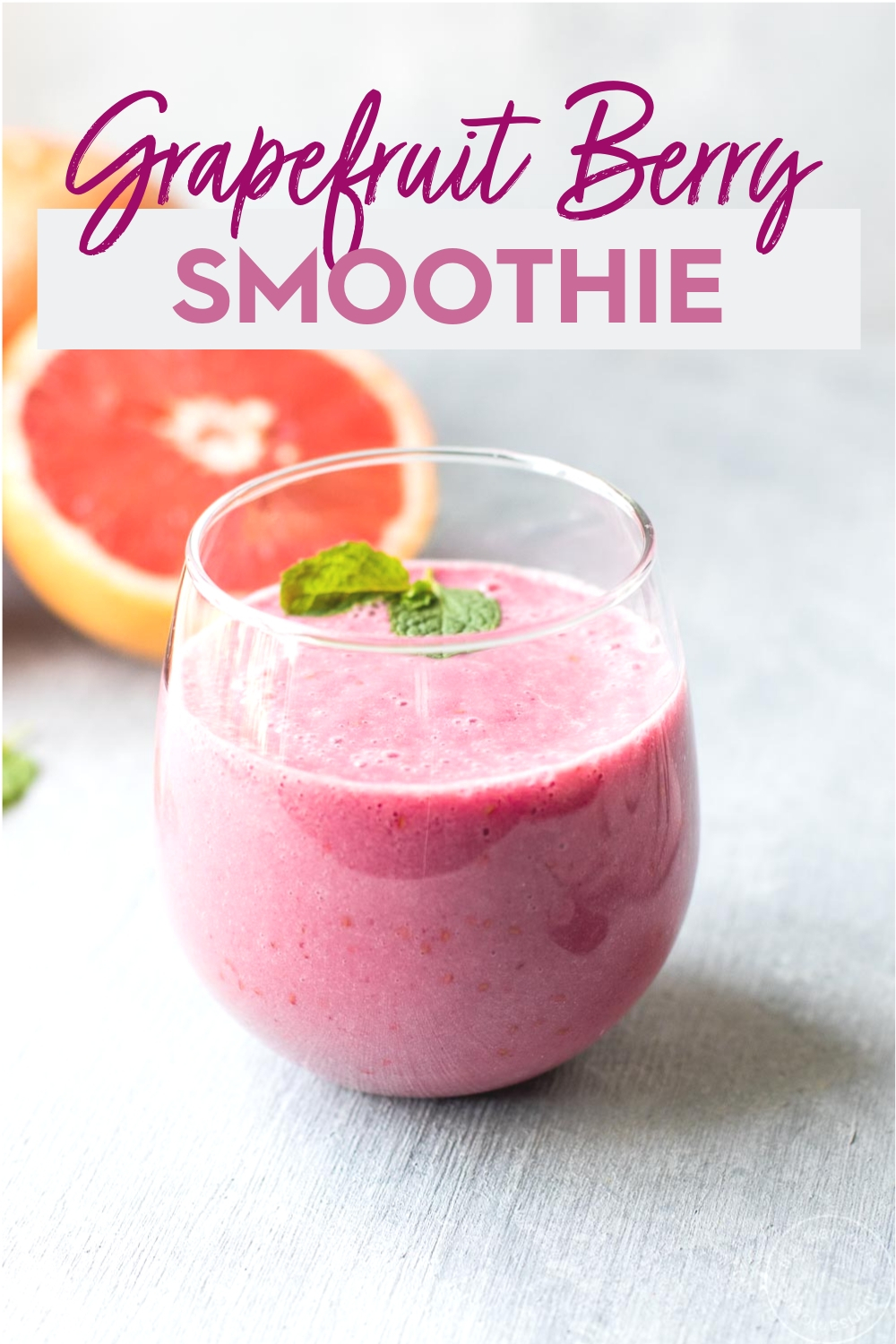 grapefruit berry smoothie in glass with text