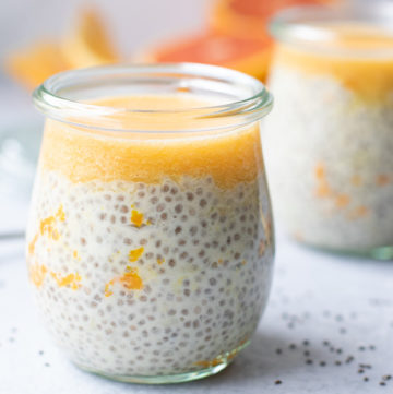 orange vanilla chia seed pudding in jars with spoon 2