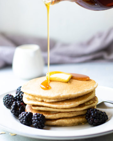 Oat Flour Pancakes with Syrup pouring