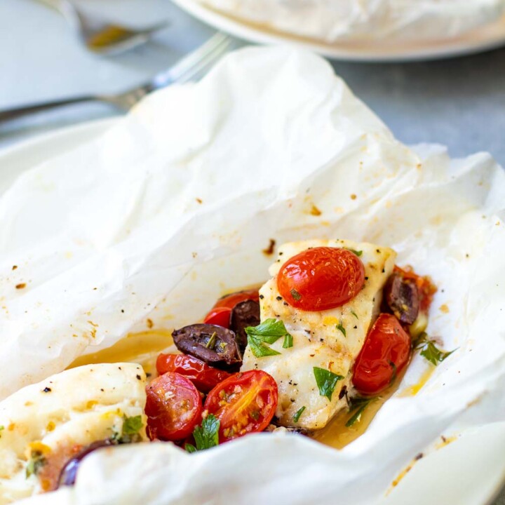 Mediterranean Cod in Parchment with lemon on a plate