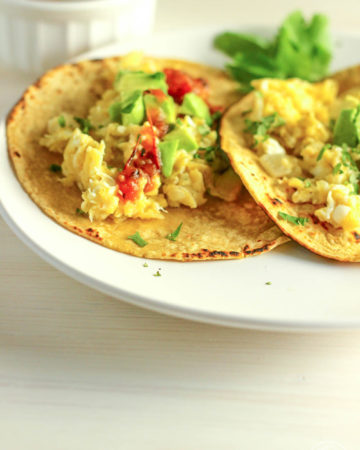 egg and avocado tacos on a plate