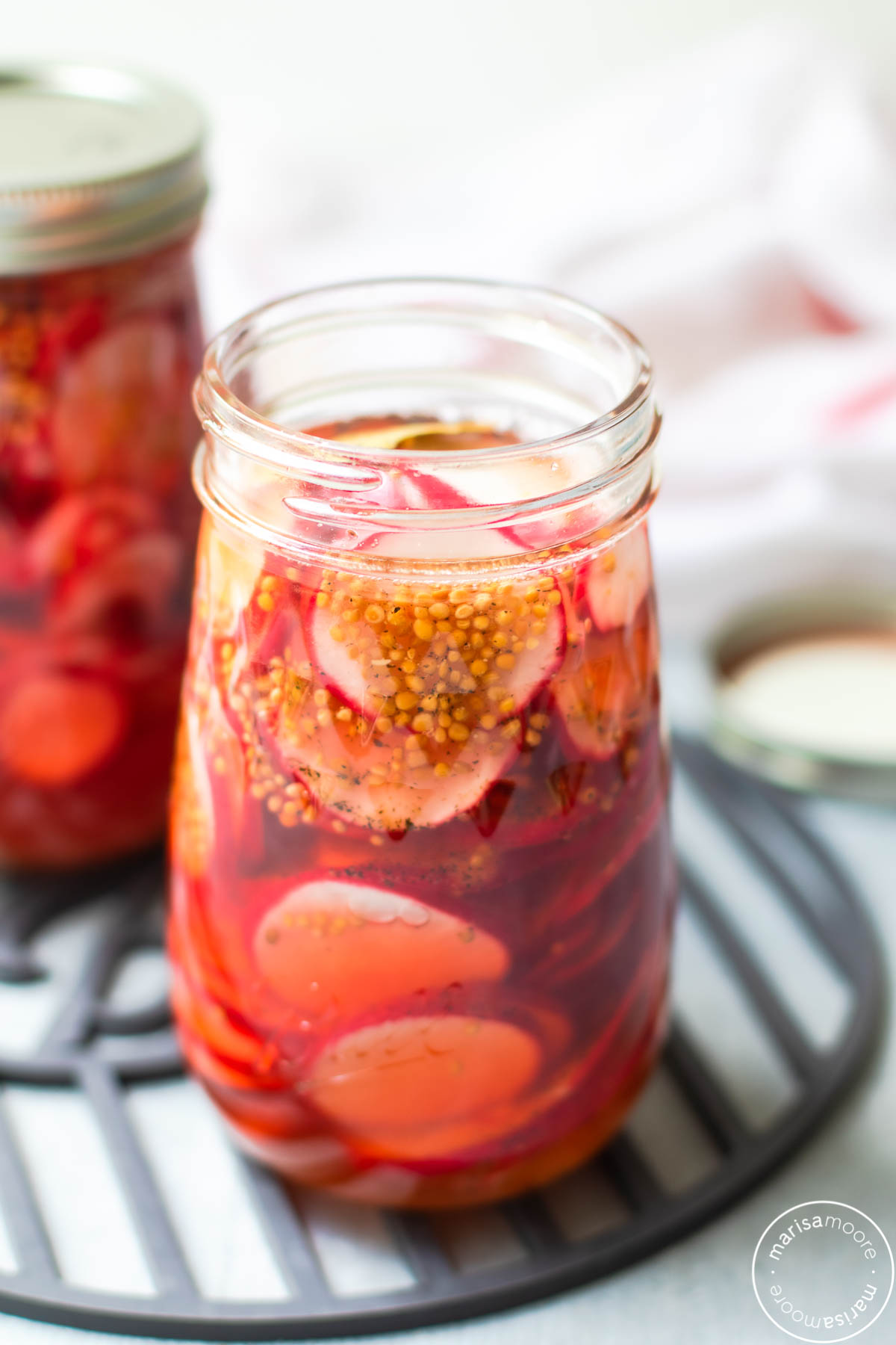 Pickled radishes in two jars
