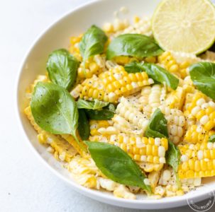 corn salad in a white bowl