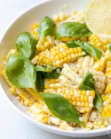 corn salad in a white bowl