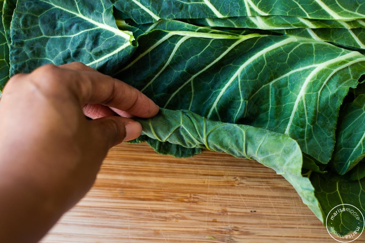 Marisa rolling collard leaves