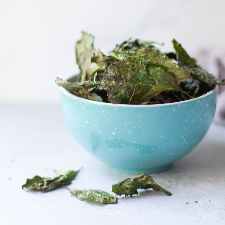 Kale chips in a blue bowl