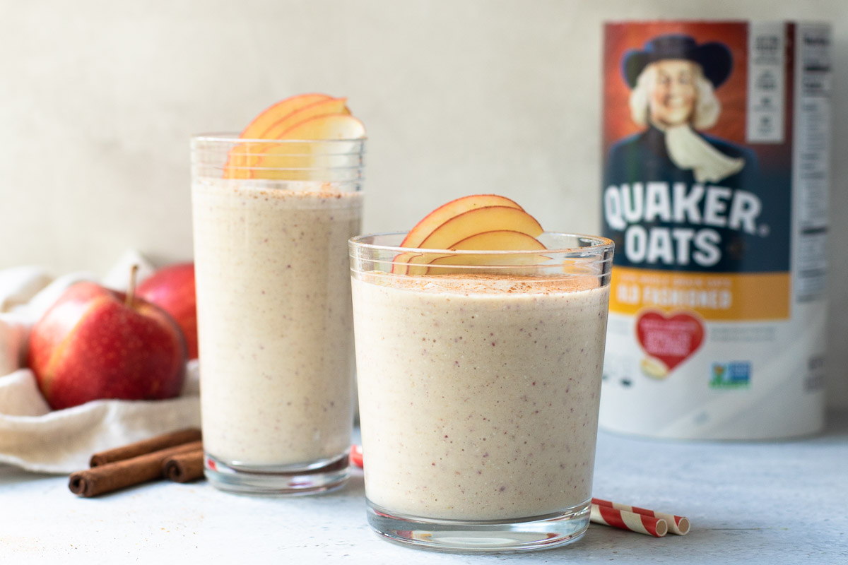 Smoothies with Quaker Oats can and apples in the background 