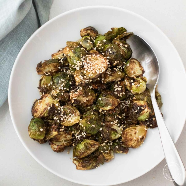 Brussels Sprouts in a Bowl with a serving spoon.