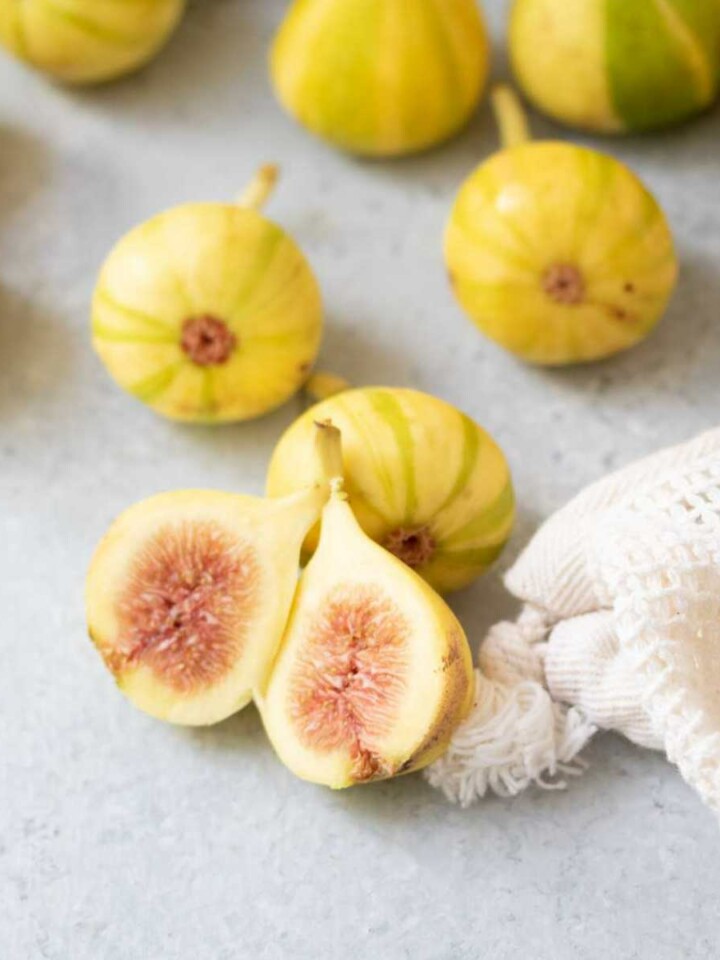 Tiger figs with one sliced in half.